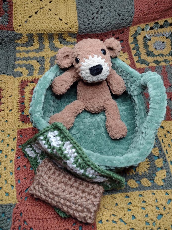 Hand-crafted baby bear with accessories